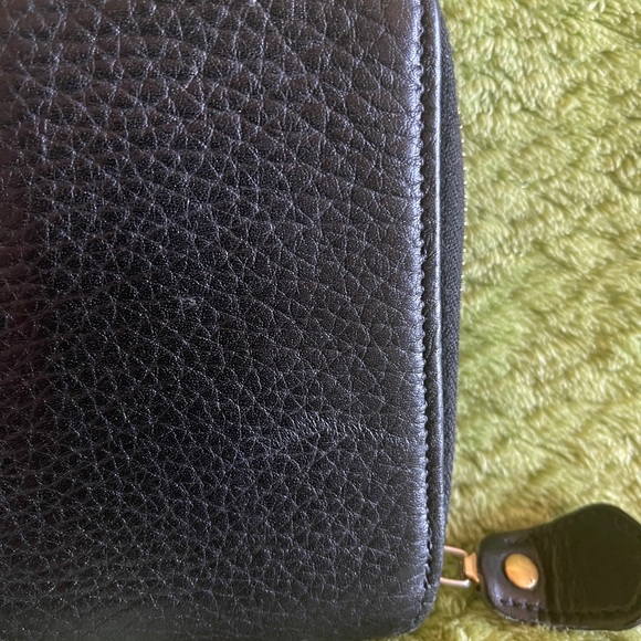 Dooney and Bourke zip along wallet in solid black. - Picture 12 of 12